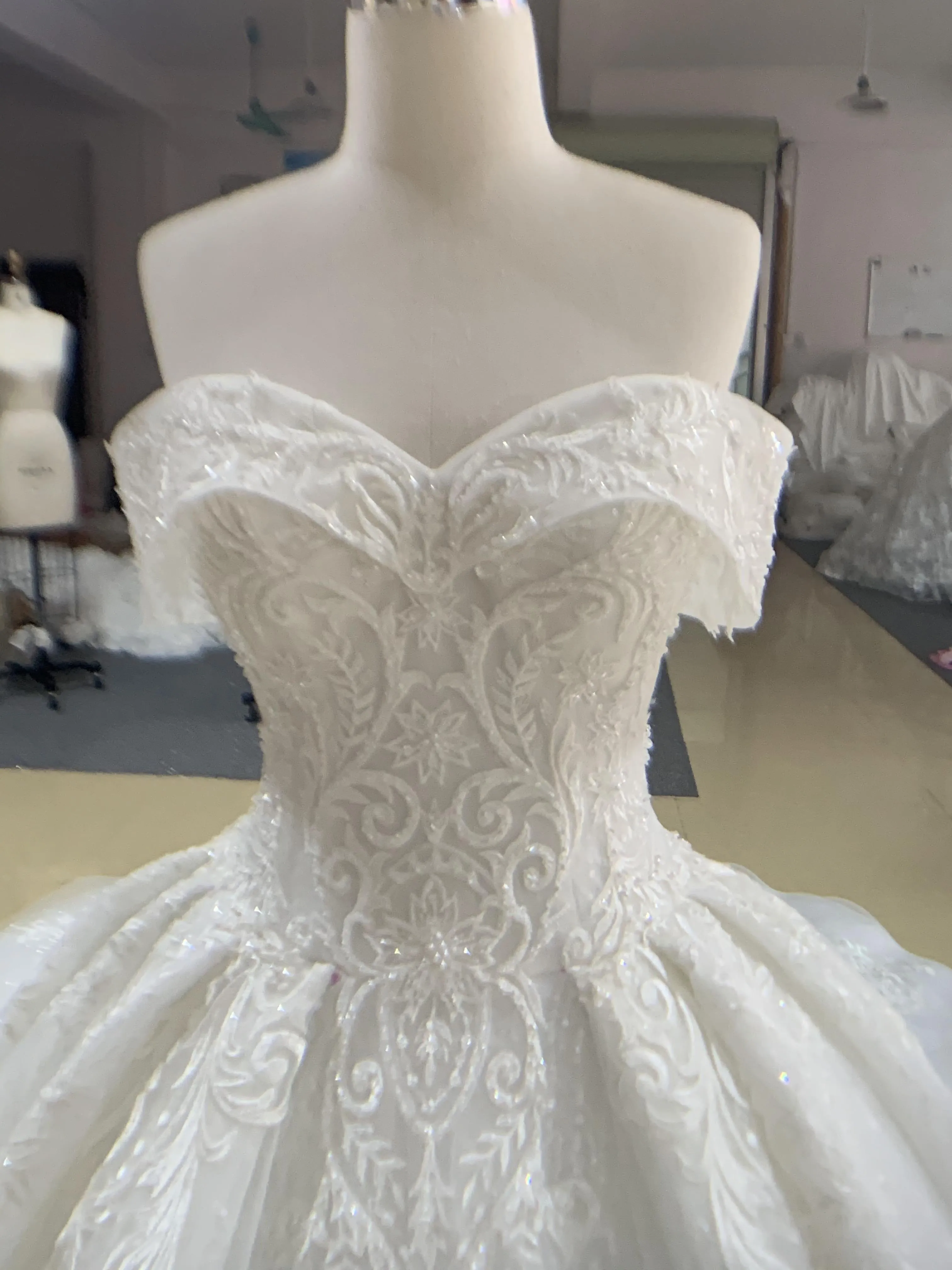 BYG luxury off the shoulder ball gown with long train