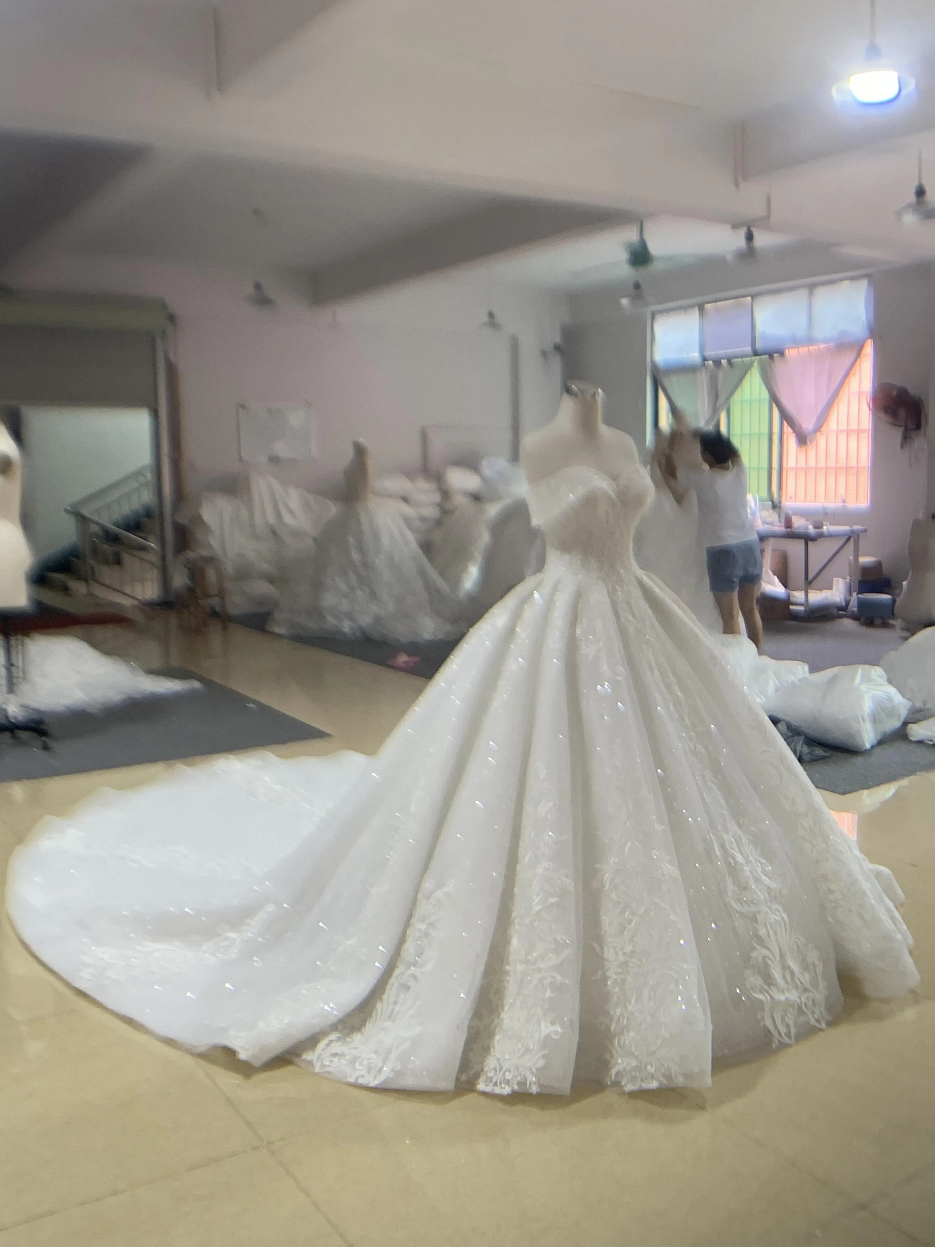BYG luxury off the shoulder ball gown with long train